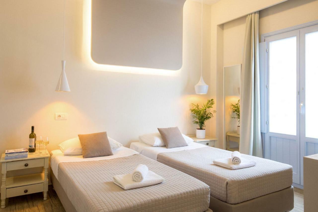 Light Blue Window Kamari Apartment Exterior photo